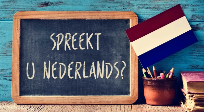 Dutch language chalk board saying spreekt U nederlands