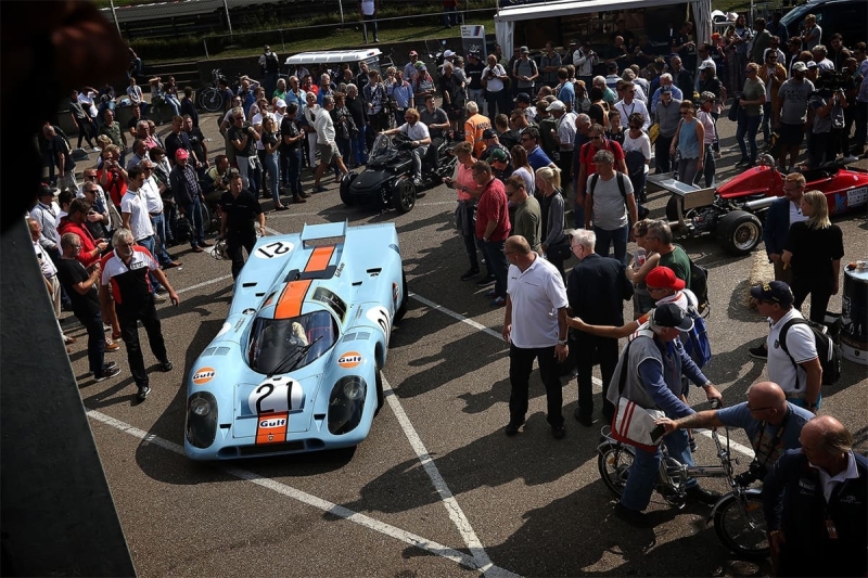 Spectators around a super race car at a HARC event