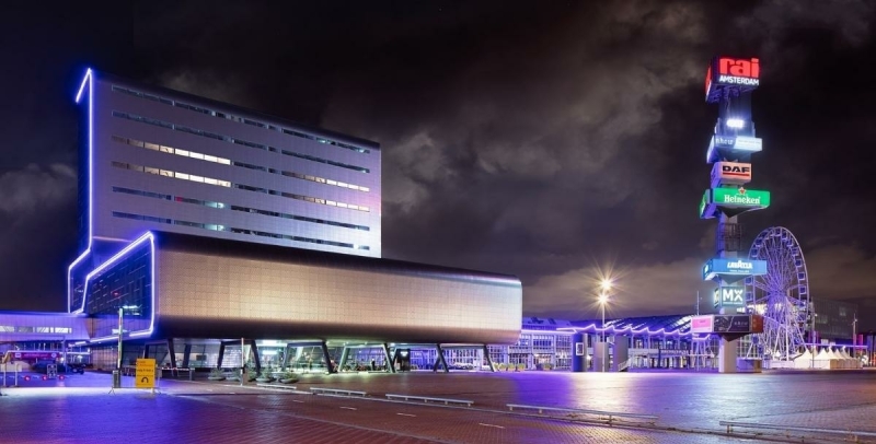 The RAI convention centre, with a ferry wheel next to it