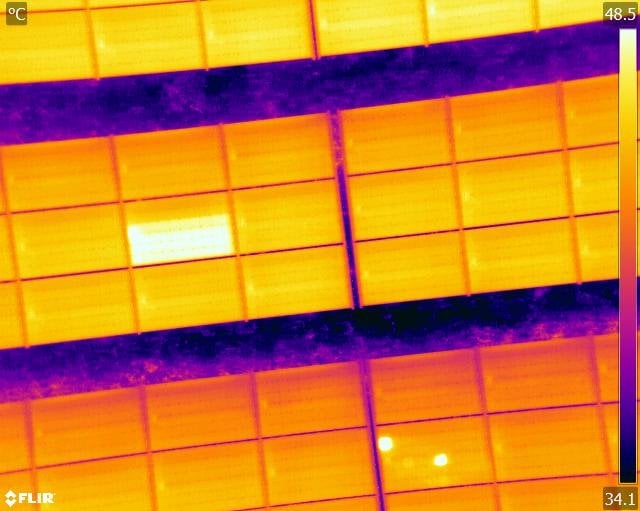 On-site thermal imaging at solar farm using drone