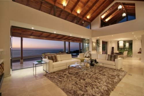 Relax in de ruime woonkamer(s) van Villa Ava Villa Ava in Kaapstad | Exclusive Culitravel