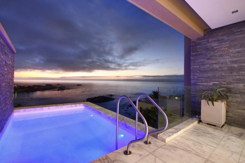 Geniet van het heerlijke klimaat in tuin,terras en aan uw eigen zwembad Villa Bay Views in Kaapstad | Exclusive Culitravel