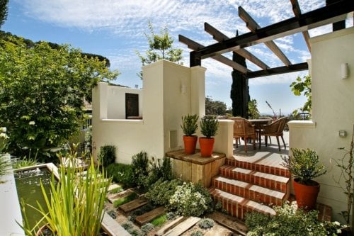 Geniet van het heerlijke klimaat in tuin en terras met jacuzzi Villa Chic Views in Kaapstad | Exclusive Culitravel