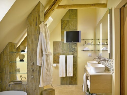 Ruime slaapkamers met grote bedden en luxueuze badkamers Villa Khoi Khoi in Steenberg Estate, Kaapstad| Exclusive Culitravel