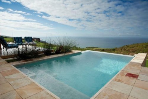 Geniet van het heerlijke klimaat in tuin,terras en aan uw eigen zwembad Villa Ocean Views in het Pezula Golf Estate, Knysna| Exclusive Culitravel