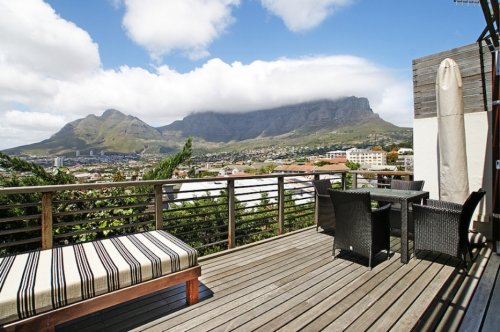 Geniet van het heerlijke klimaat op uw eigen terras met uitzicht op de tafelberg Villa Queens in Kaapstad | Exclusive Culitravel