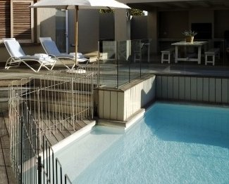 Geniet van het heerlijke klimaat in tuin,terras en aan uw eigen zwembad Villa The Owner's Beach House in Plettenberg Bay| Exclusive Culitravel