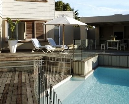 De villa is op een Top locatie Villa The Owner's Beach House in Plettenberg Bay| Exclusive Culitravel